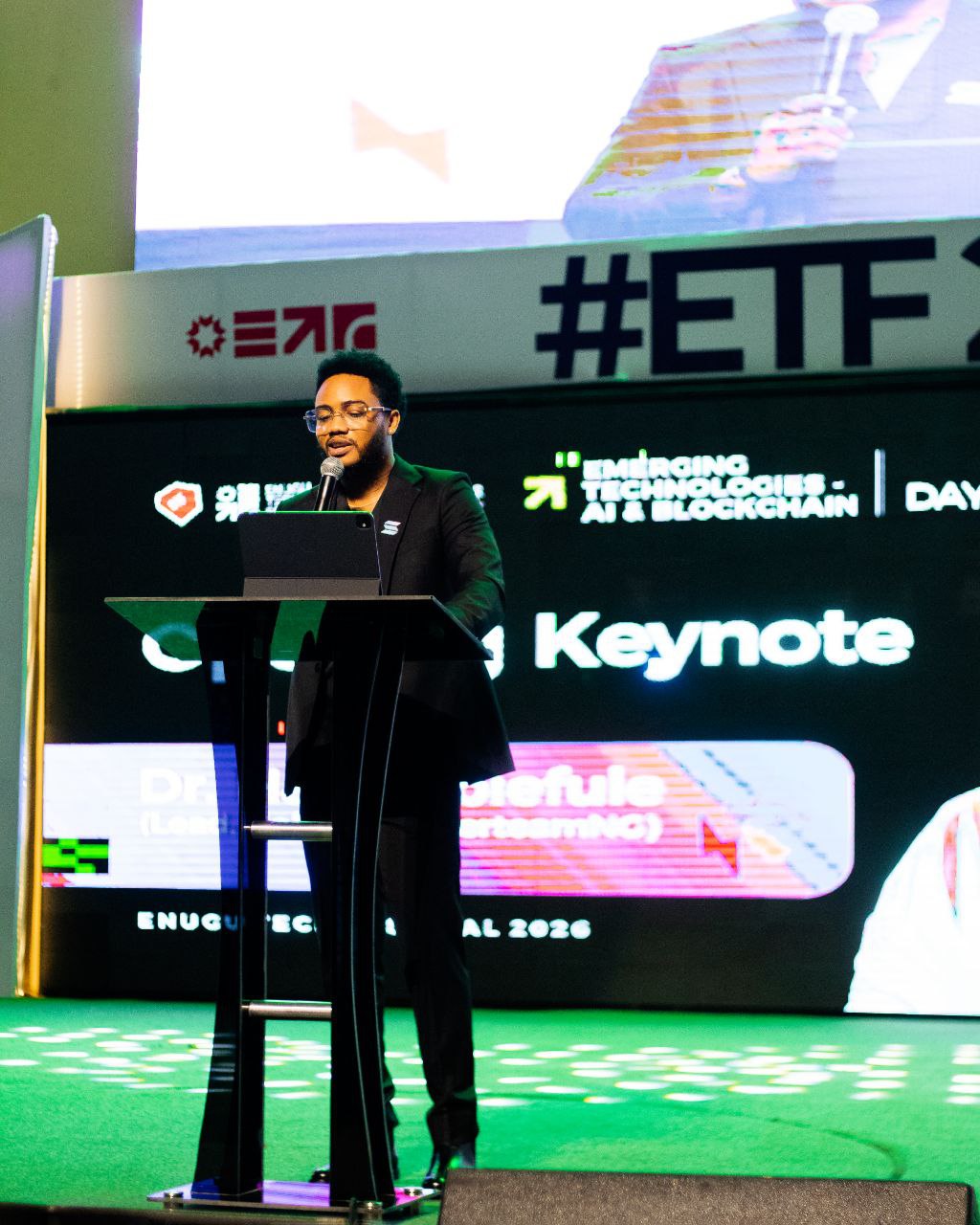 Harrison on stage at Enugu Tech Fest 2026 presenting on Emerging Technologies